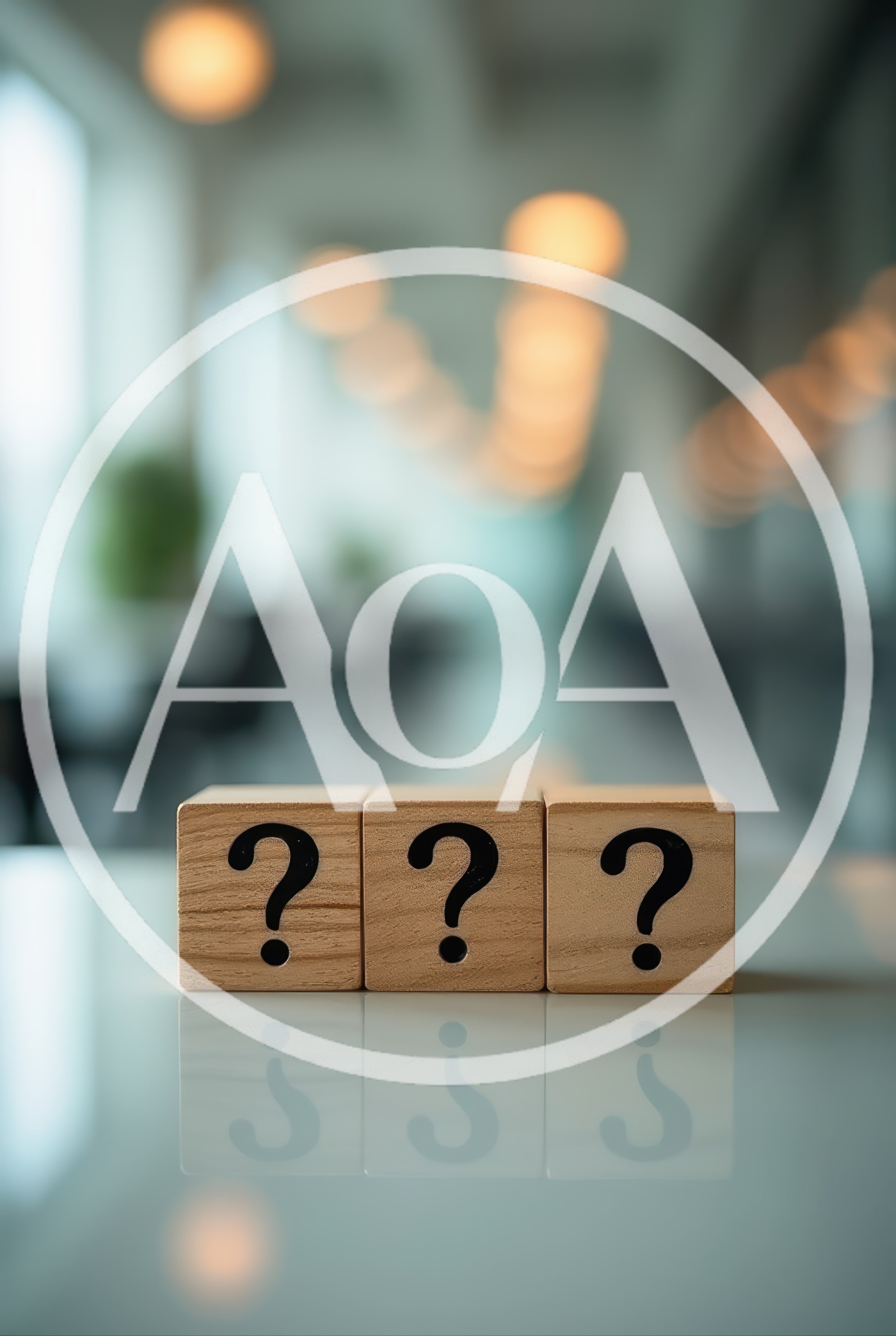 Three Wooden Blocks With Question Marks On A Table