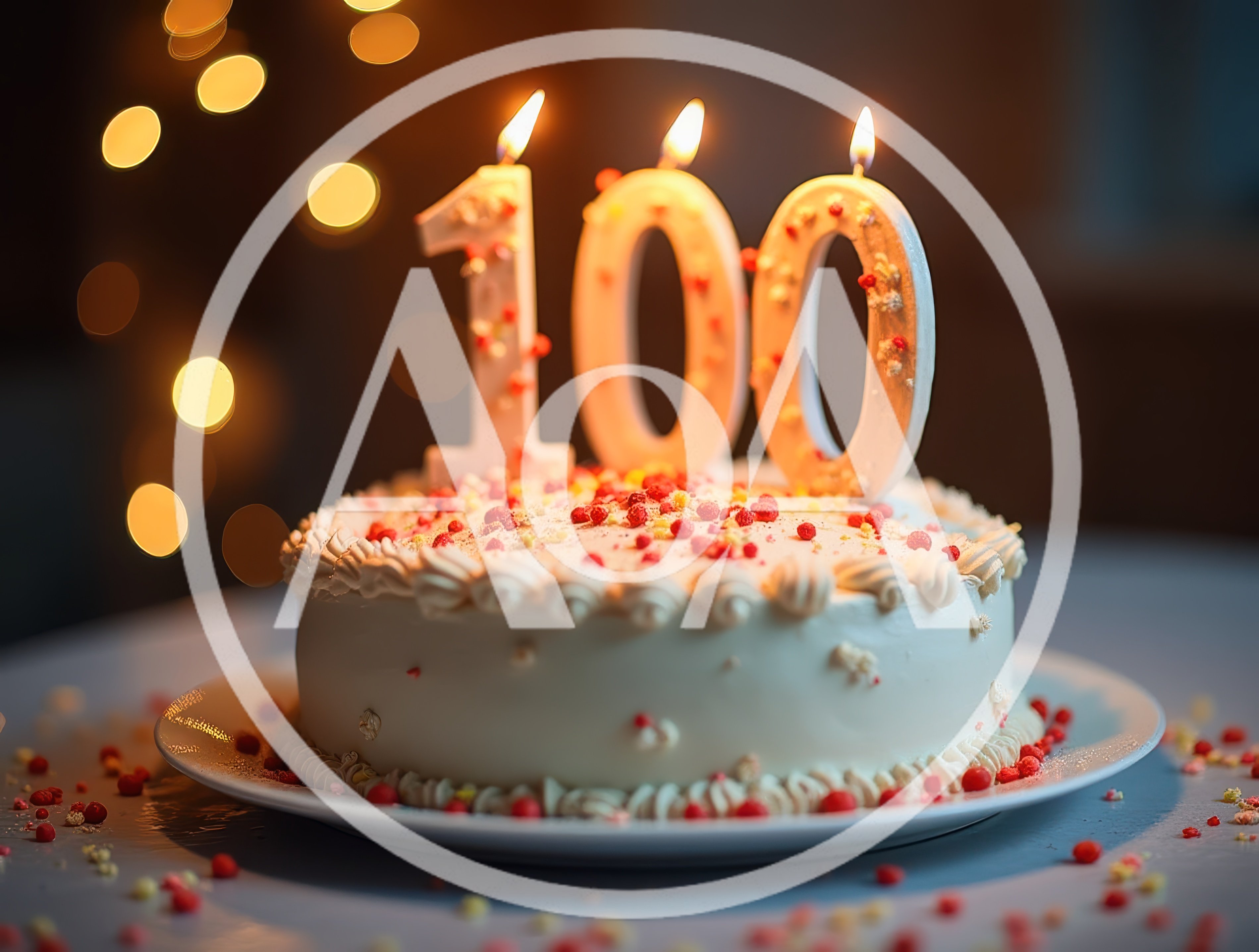100th Birthday Cake With Lit Candles