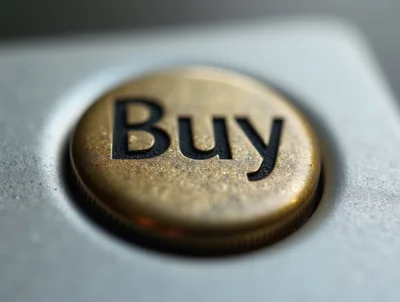 Macro Shot Of A Golden Buy Button