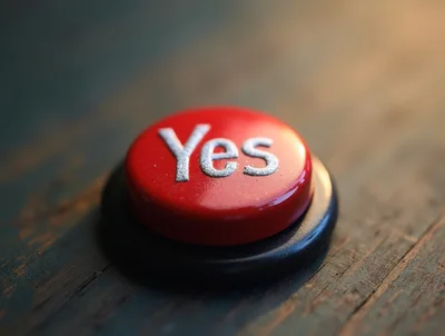 Red Yes Button On A Wooden Surface