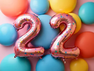 Pink Number Twenty Two Foil Balloons on Colorful Background