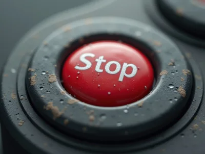 Close Up Of A Dirty Red Stop Button