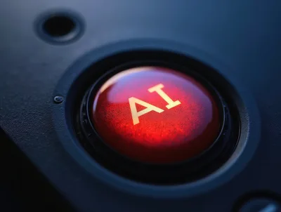 Close Up Of A Glowing Red AI Button
