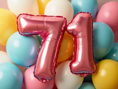 Pink Foil Number 71 Balloons Against Colorful Background