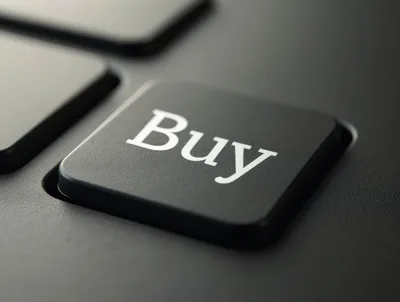 Close Up Of A Black Keyboard Key Labeled Buy