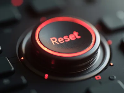 Glowing Red Reset Button on a Futuristic Control Panel