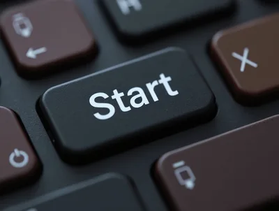 Close Up Of A Start Button On A Keyboard
