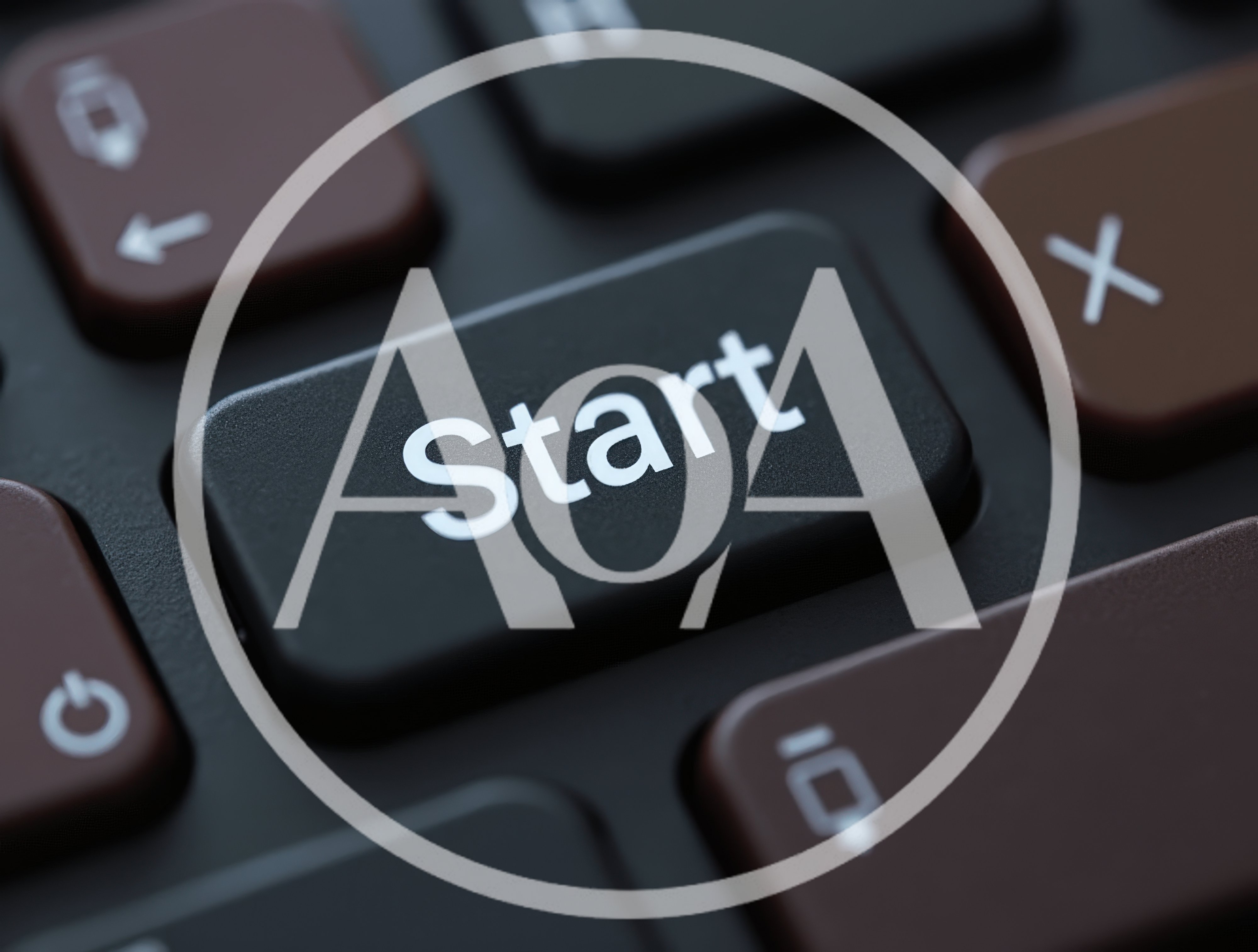 Close Up Of A Start Button On A Keyboard
