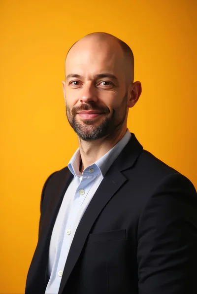 Professional Bald Man In Suit Against Yellow Background