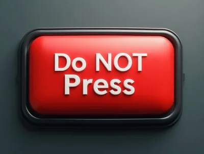 Red Rectangular Button With Do Not Press Text