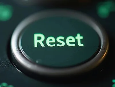 Close Up Of A Glowing Green Reset Button