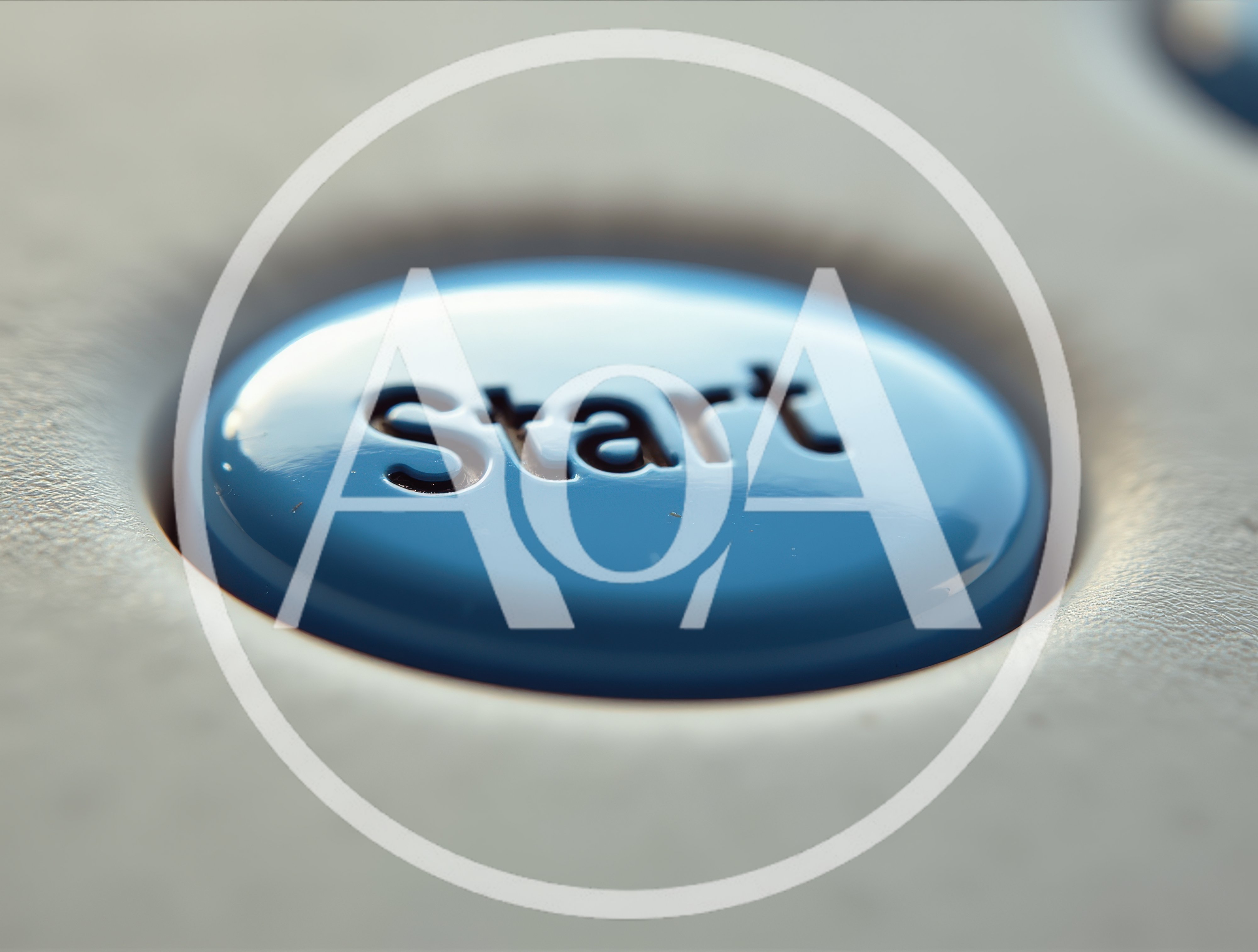 Macro Close Up Of A Blue Start Button