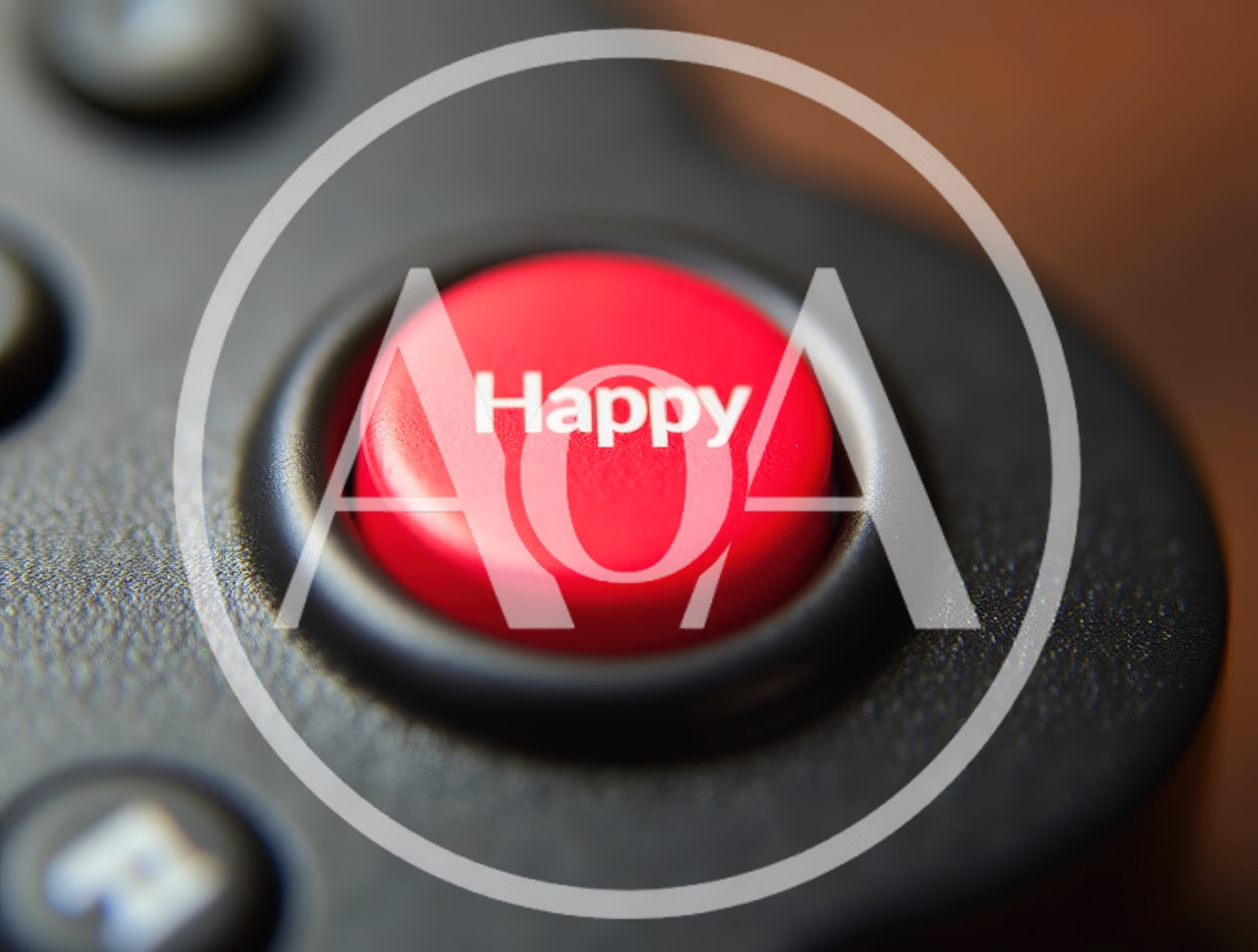 Close Up Of A Red Happy Button On Remote