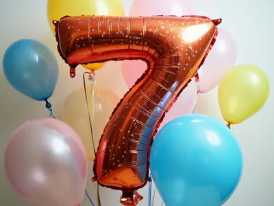 Red Number Seven Balloon With Colorful Party Balloons