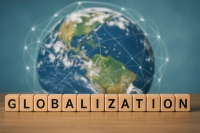 Globalization Concept With Wooden Letter Blocks And Earth Globe