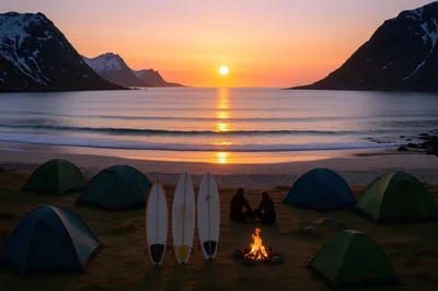 Couple Camping With Surfboards At Sunset Beach