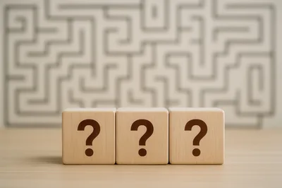 Three Wooden Blocks With Question Marks