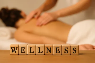 Wooden Blocks Spelling Wellness During A Professional Massage