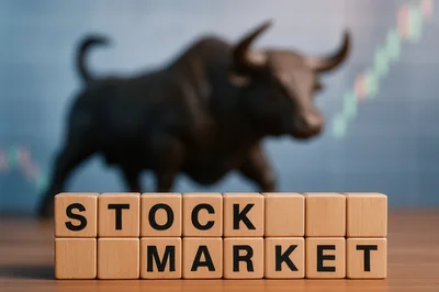 Wooden Blocks Spelling Stock Market With Bull Statue