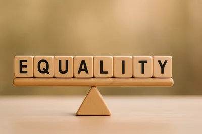Wooden Blocks Spelling Equality Balanced On A Scale