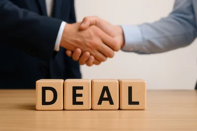 Business Partners Shaking Hands Over Deal Wooden Blocks