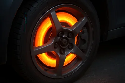 Glowing Hot Brake Rotor on Car Wheel