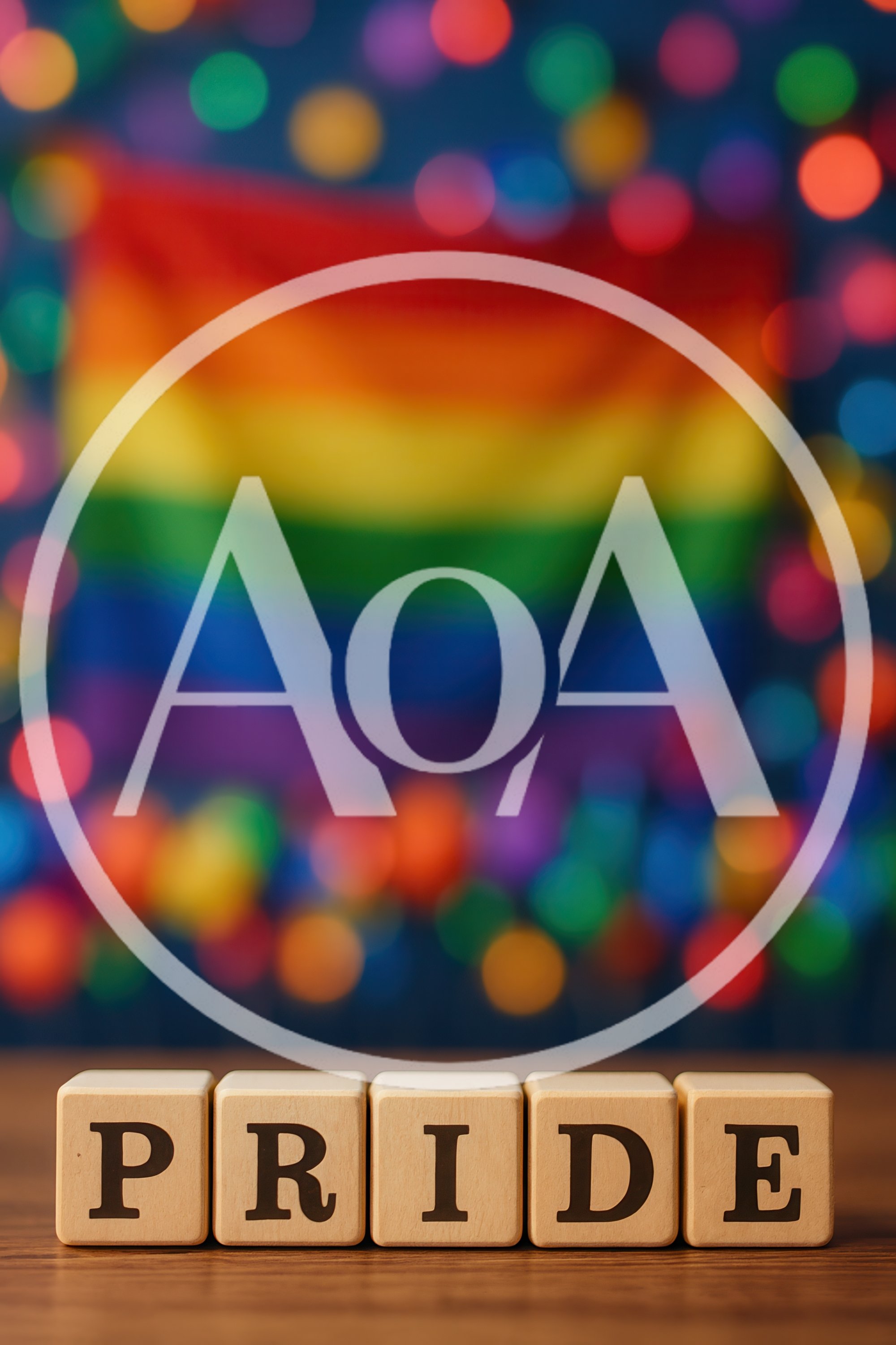 Wooden Blocks Spelling Pride With Rainbow Flag Background