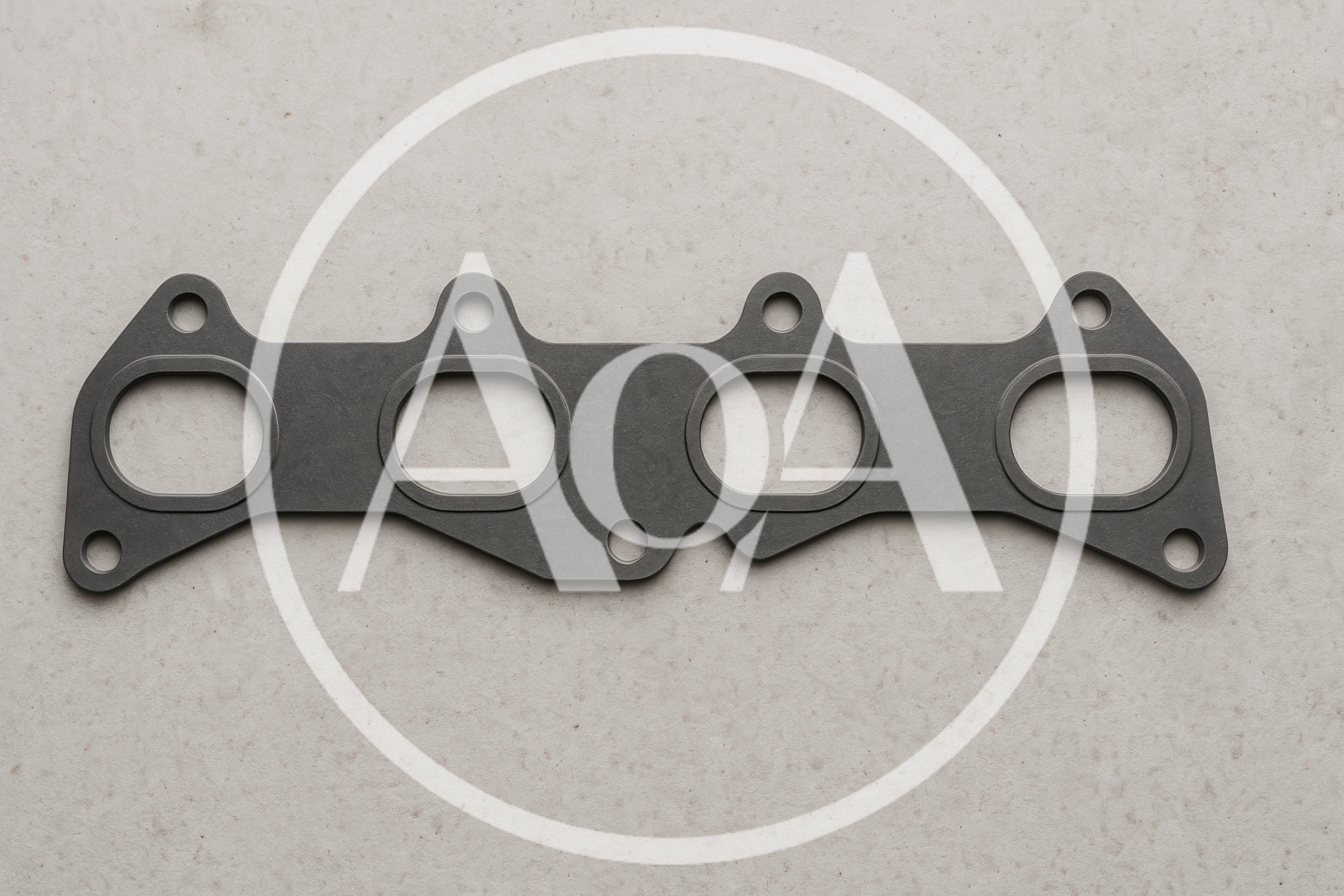 Automotive Exhaust Manifold Gasket on Textured Background