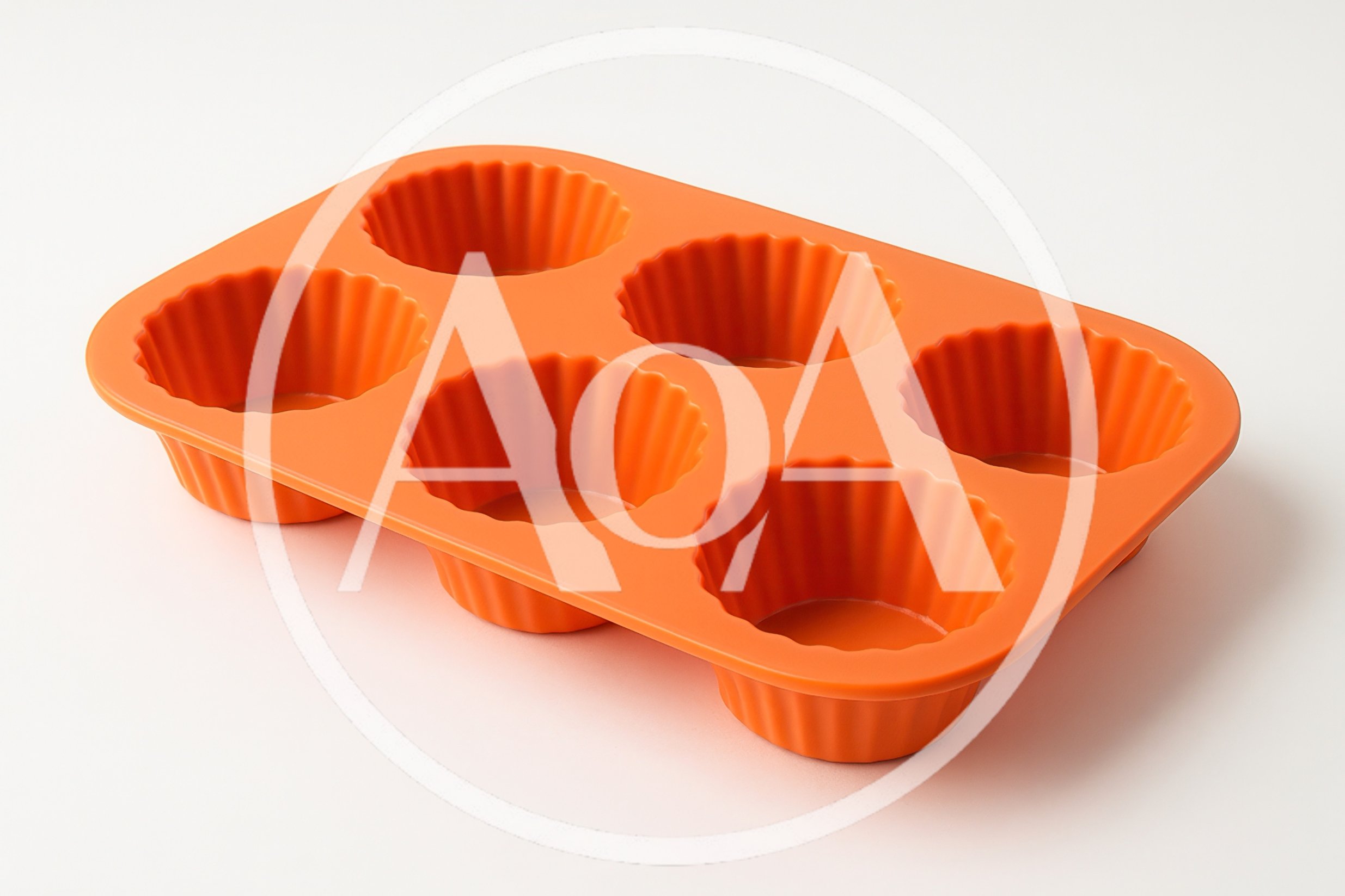 Orange Silicone Muffin Pan On White Background