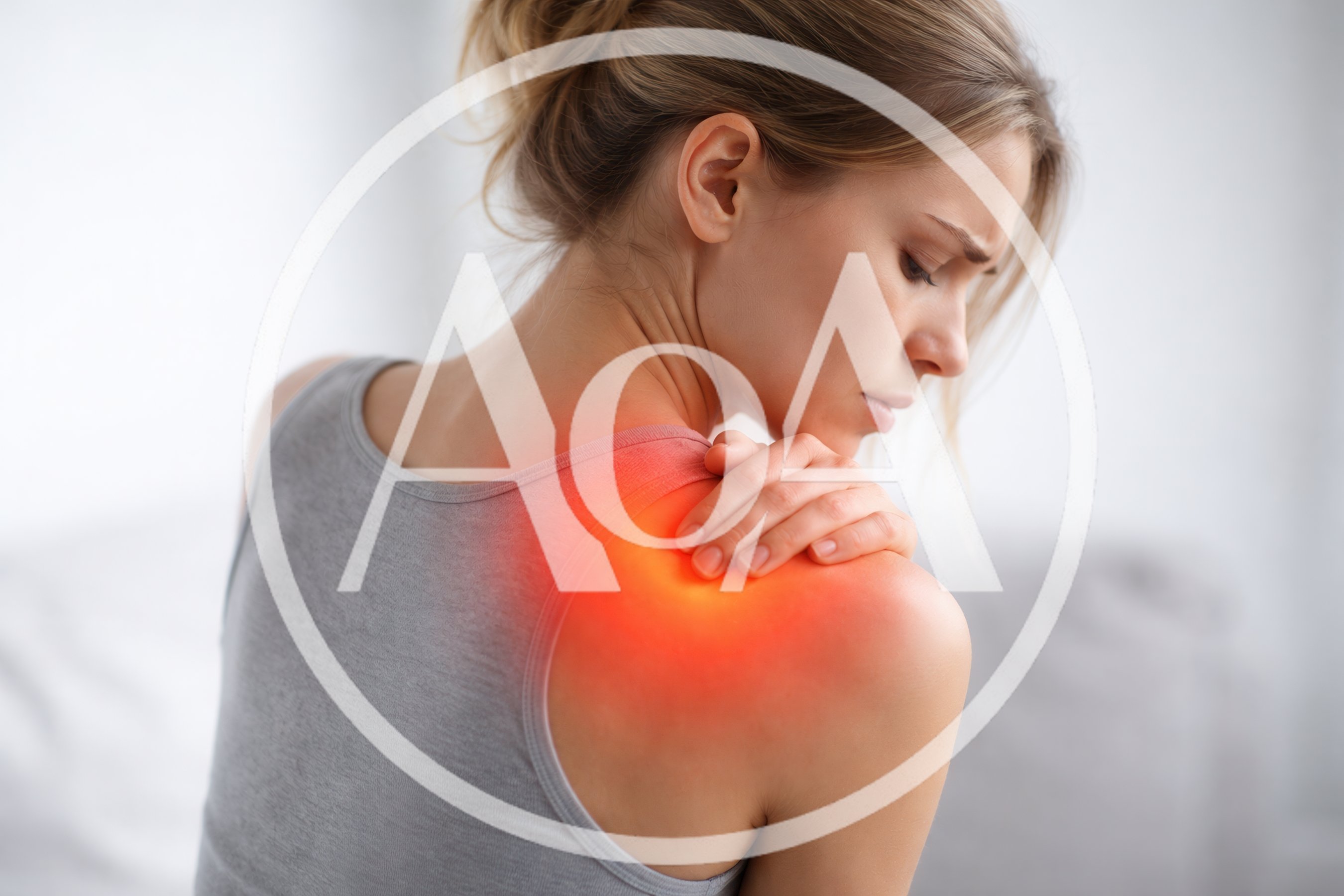 Young Woman Suffering From Severe Shoulder Pain