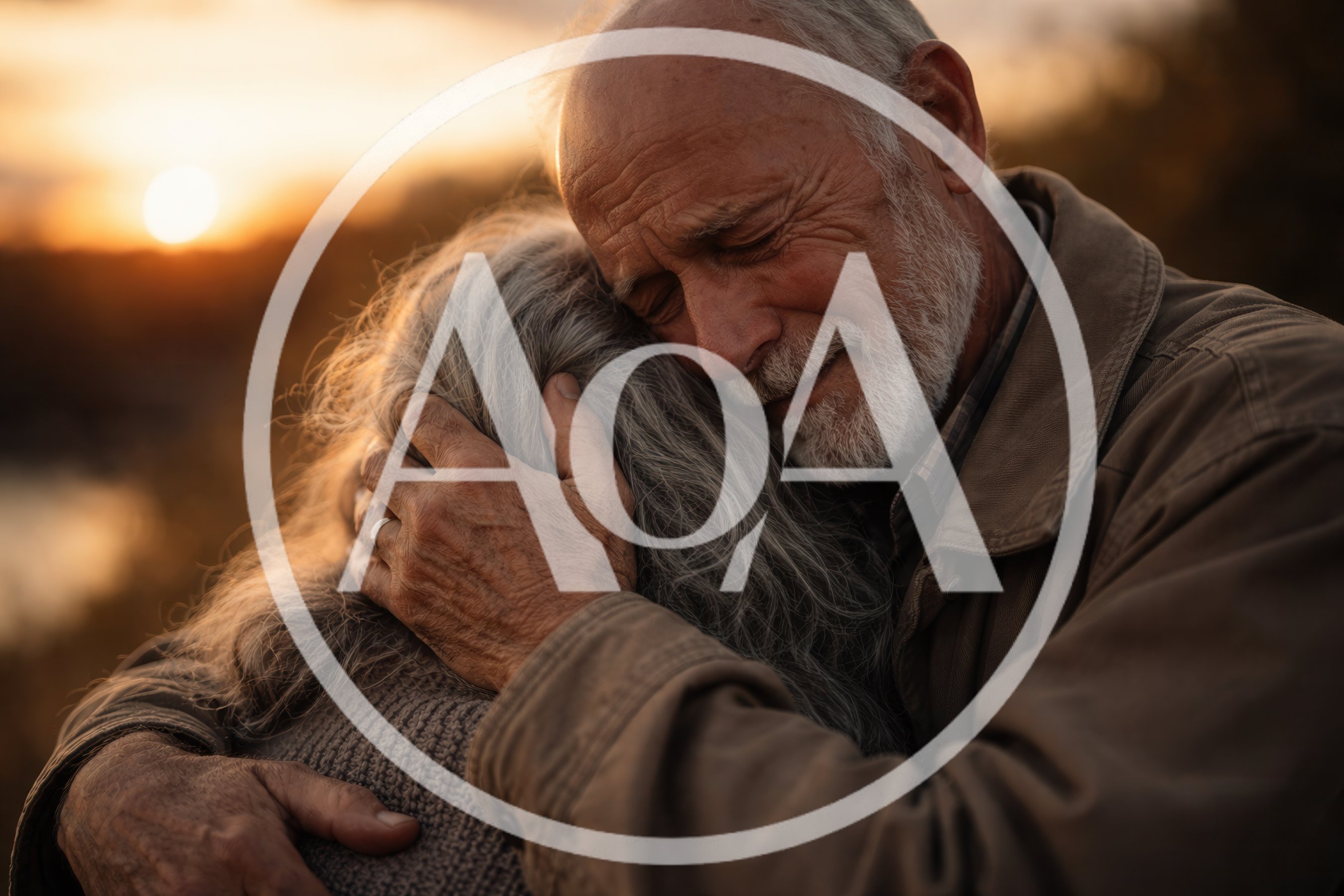 Elderly Couple Embracing During A Golden Hour Sunset
