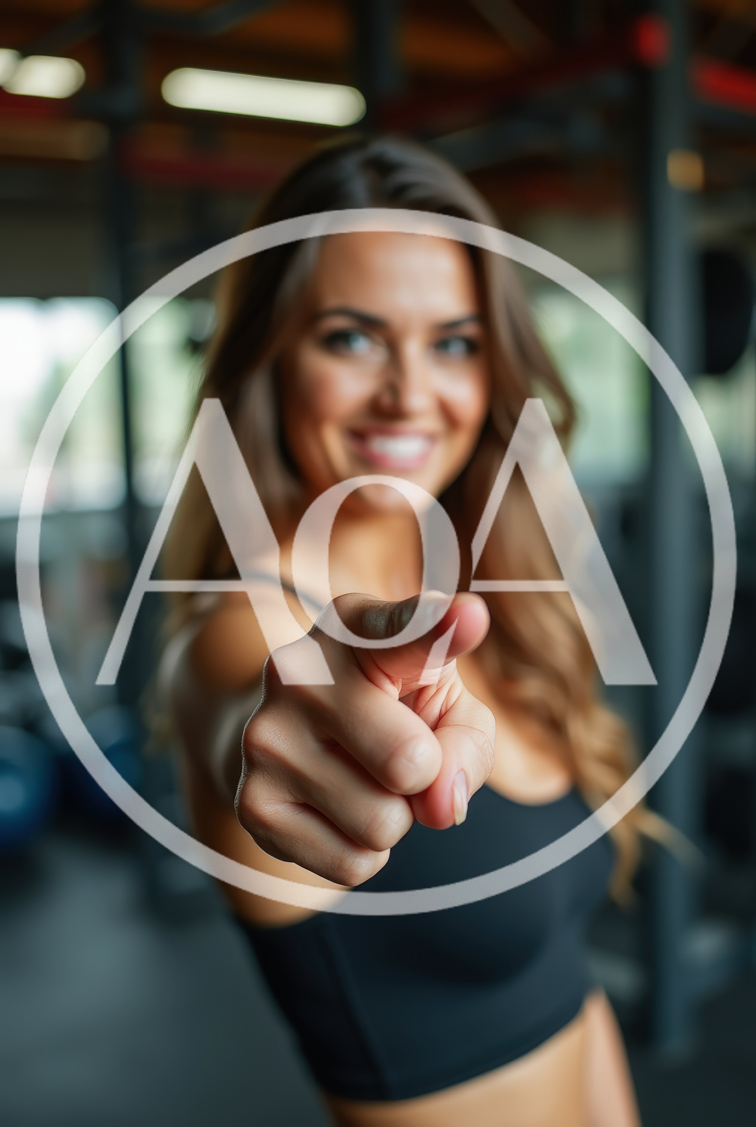 Smiling Woman Pointing Directly At Camera In Gym