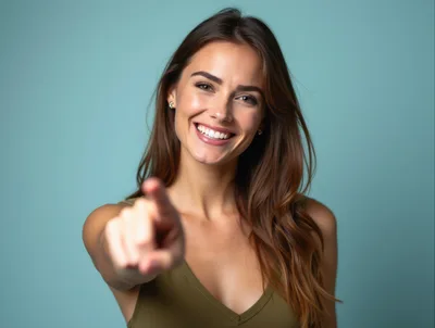 Smiling Woman Pointing Directly At The Camera