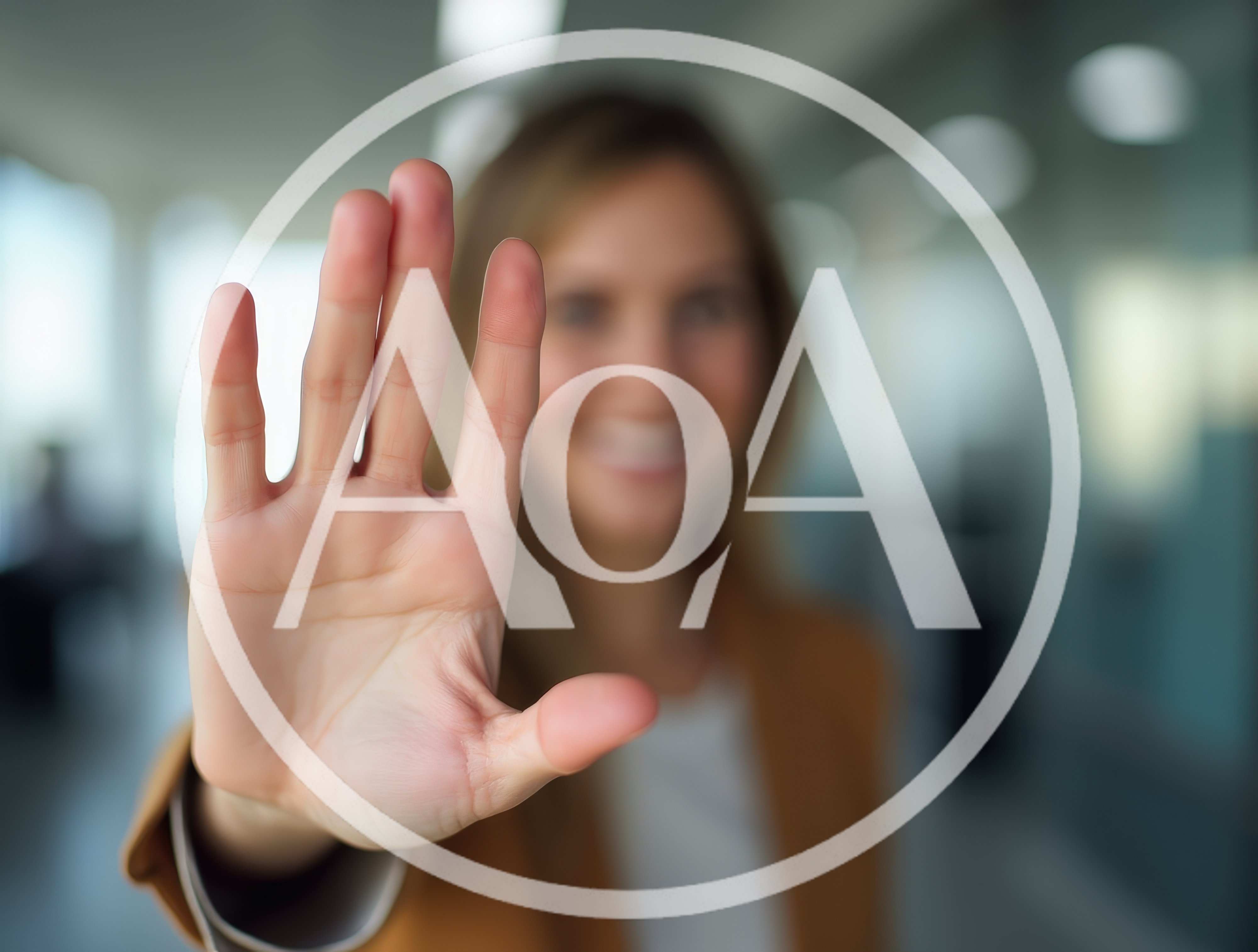 Businesswoman Holding Up Hand In Stop Gesture