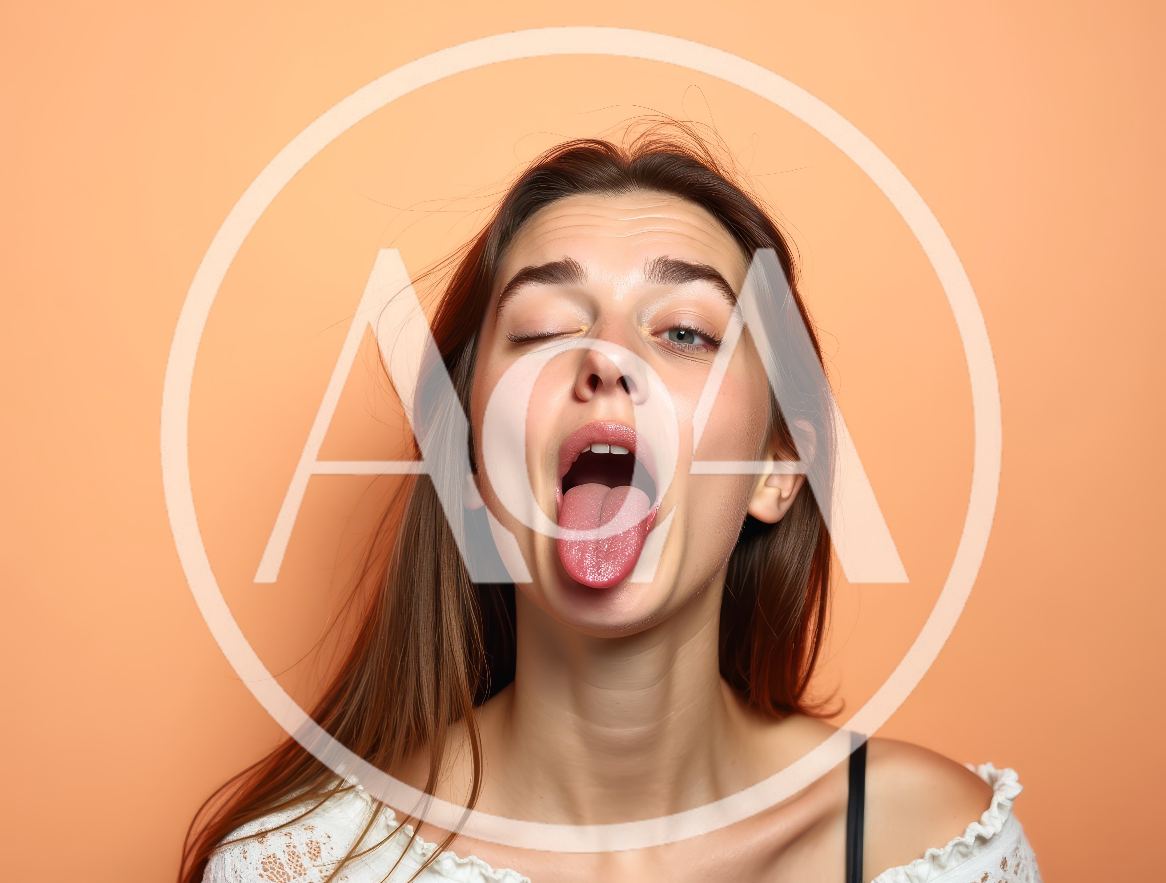 Young Woman Making A Silly Face With Tongue Out