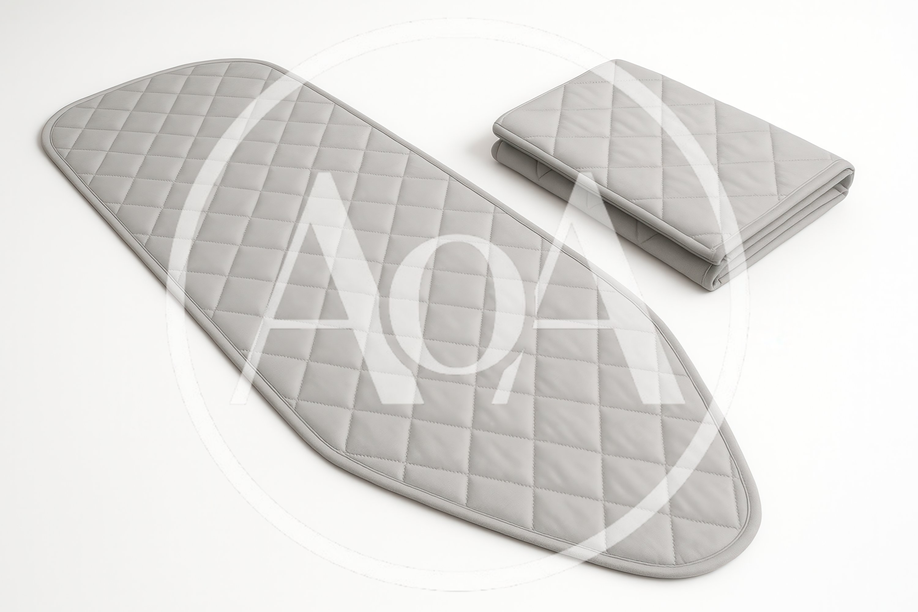Grey Quilted Ironing Board Cover and Folded Fabric