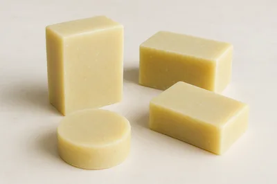 Four Bars Of Natural Handmade Soap On White Surface