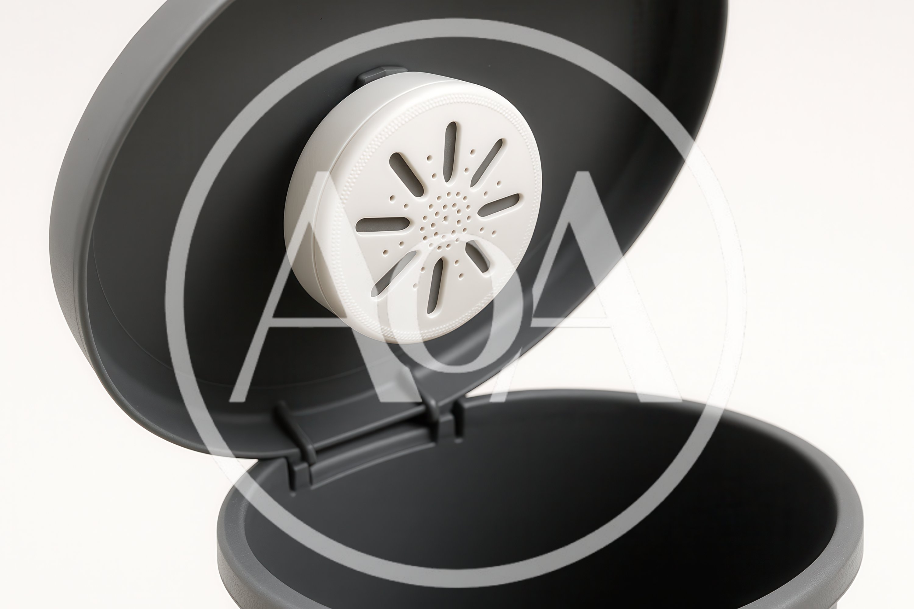 Deodorizer Pod Attached Inside A Gray Trash Can Lid