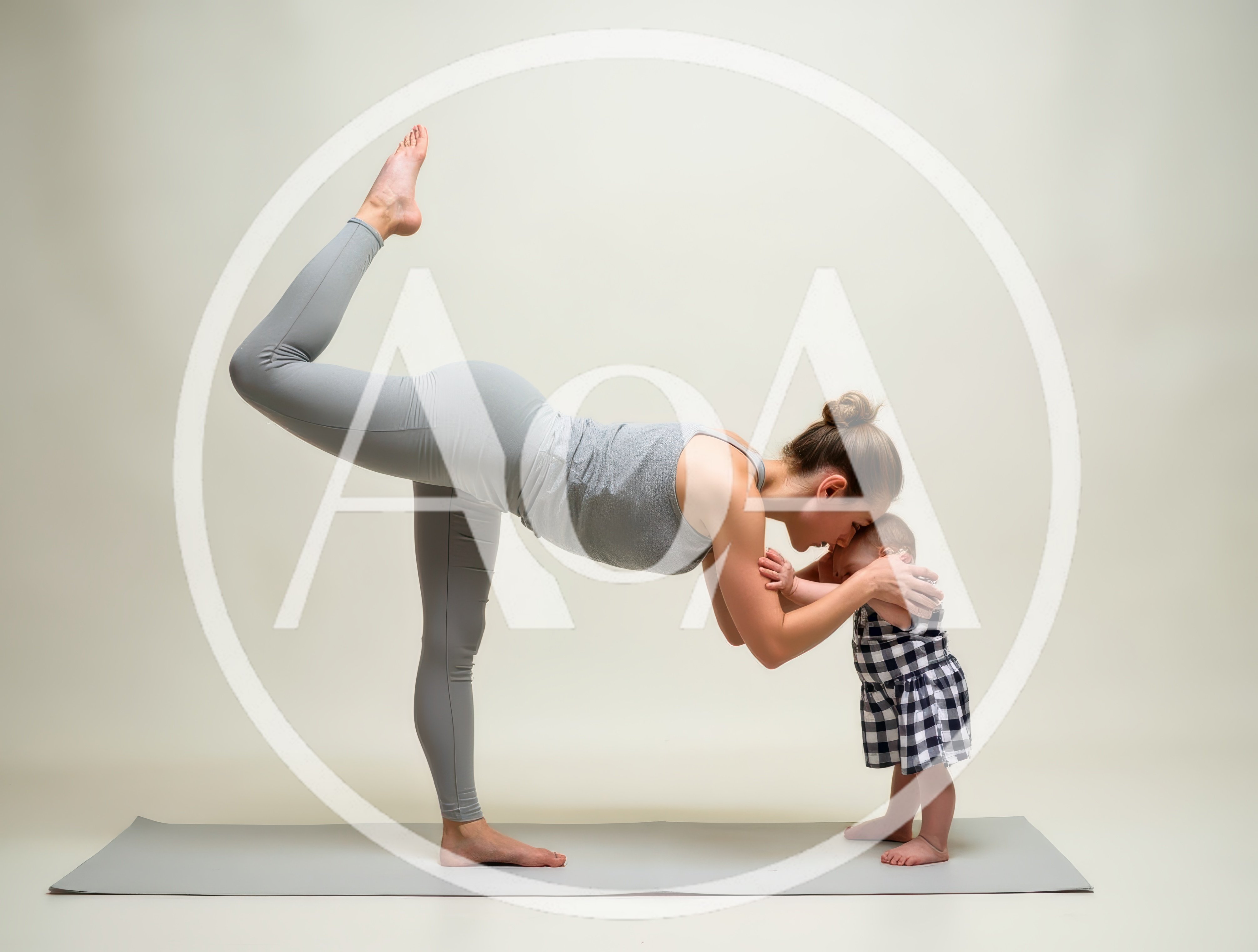 Mother Doing Yoga With Her Baby