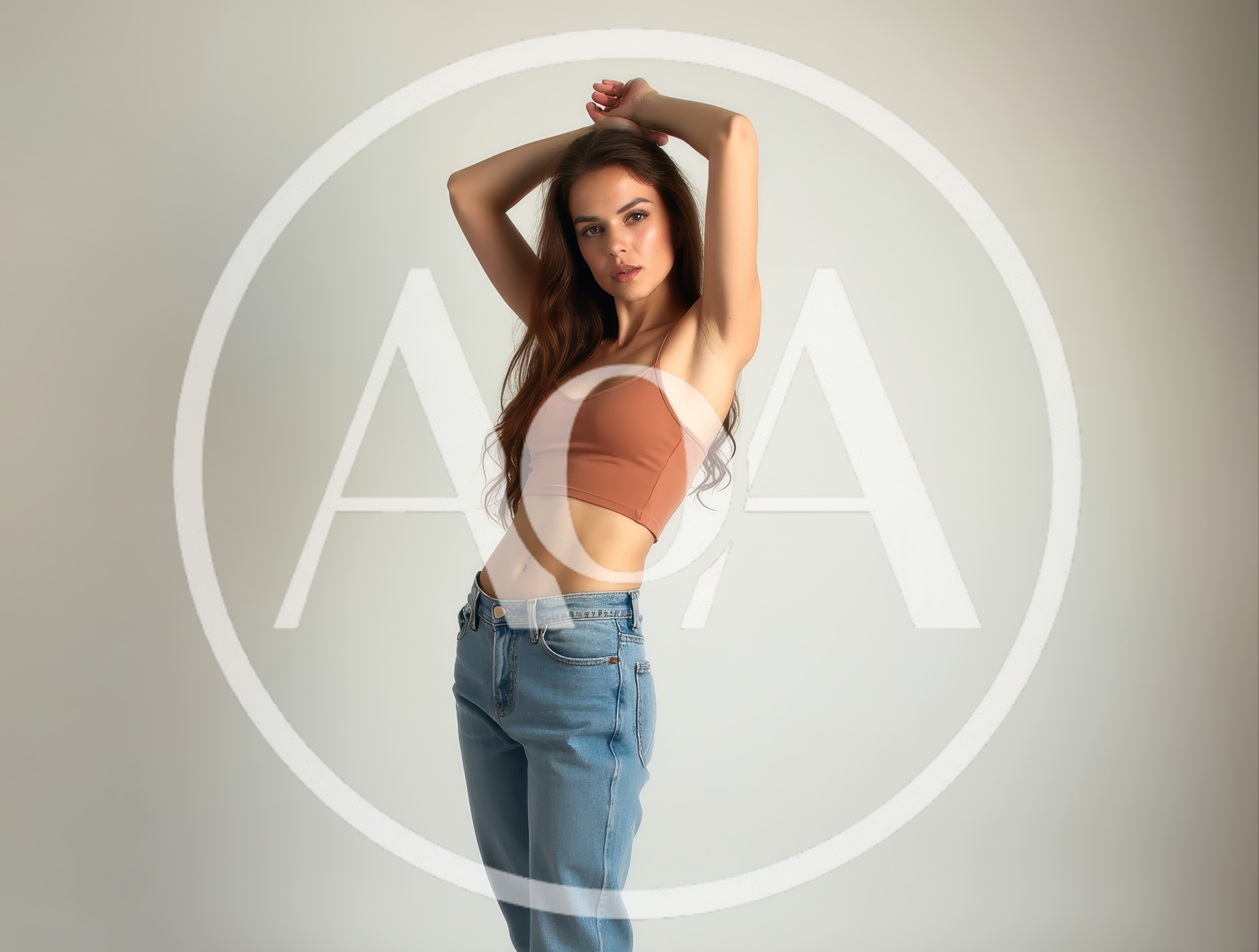 Young Woman Posing In Crop Top And Jeans