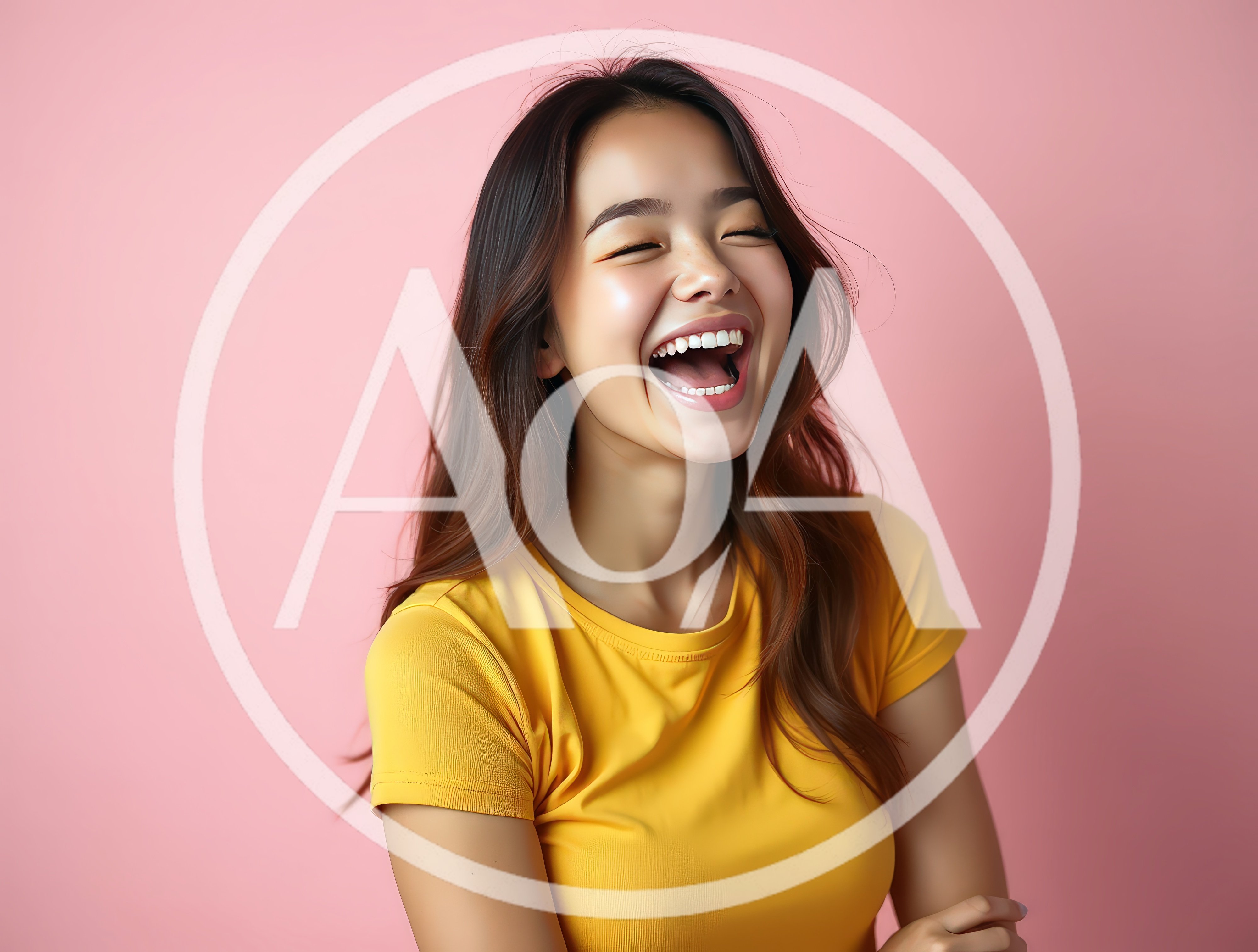 Young Asian Woman Laughing Joyfully Against Pink Background