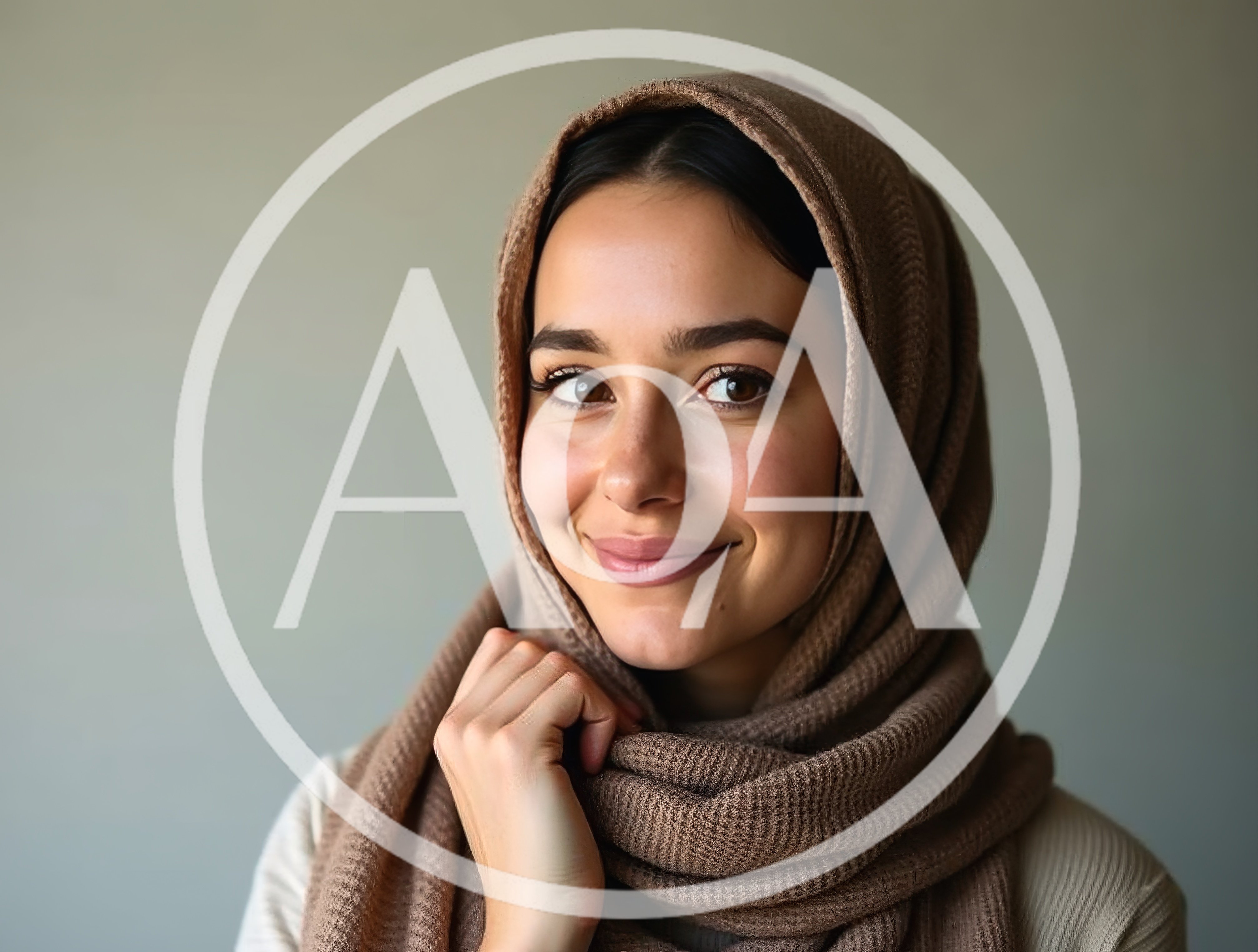 Portrait Of A Smiling Young Woman Wearing A Hijab