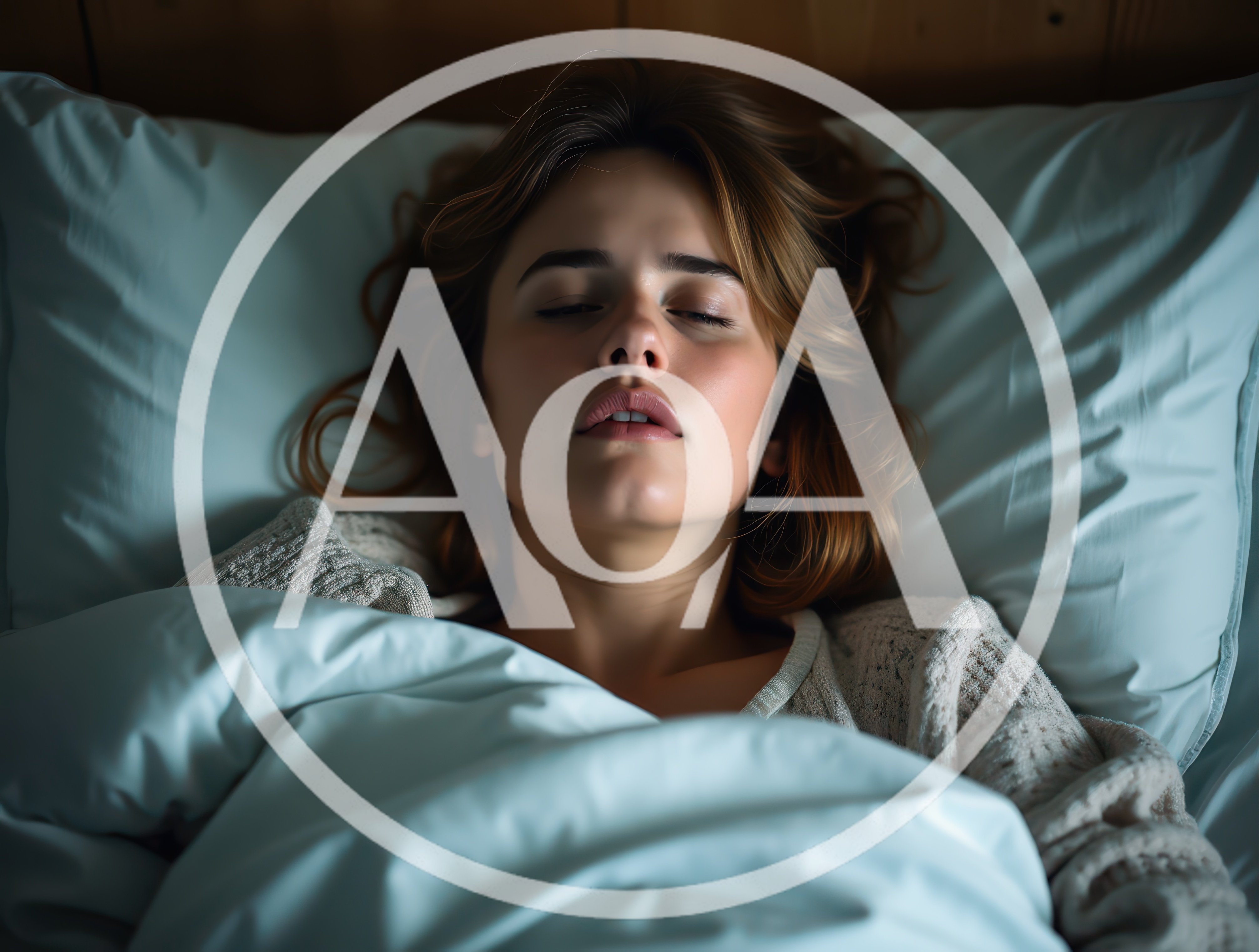 Young Woman Sleeping Peacefully In Bed