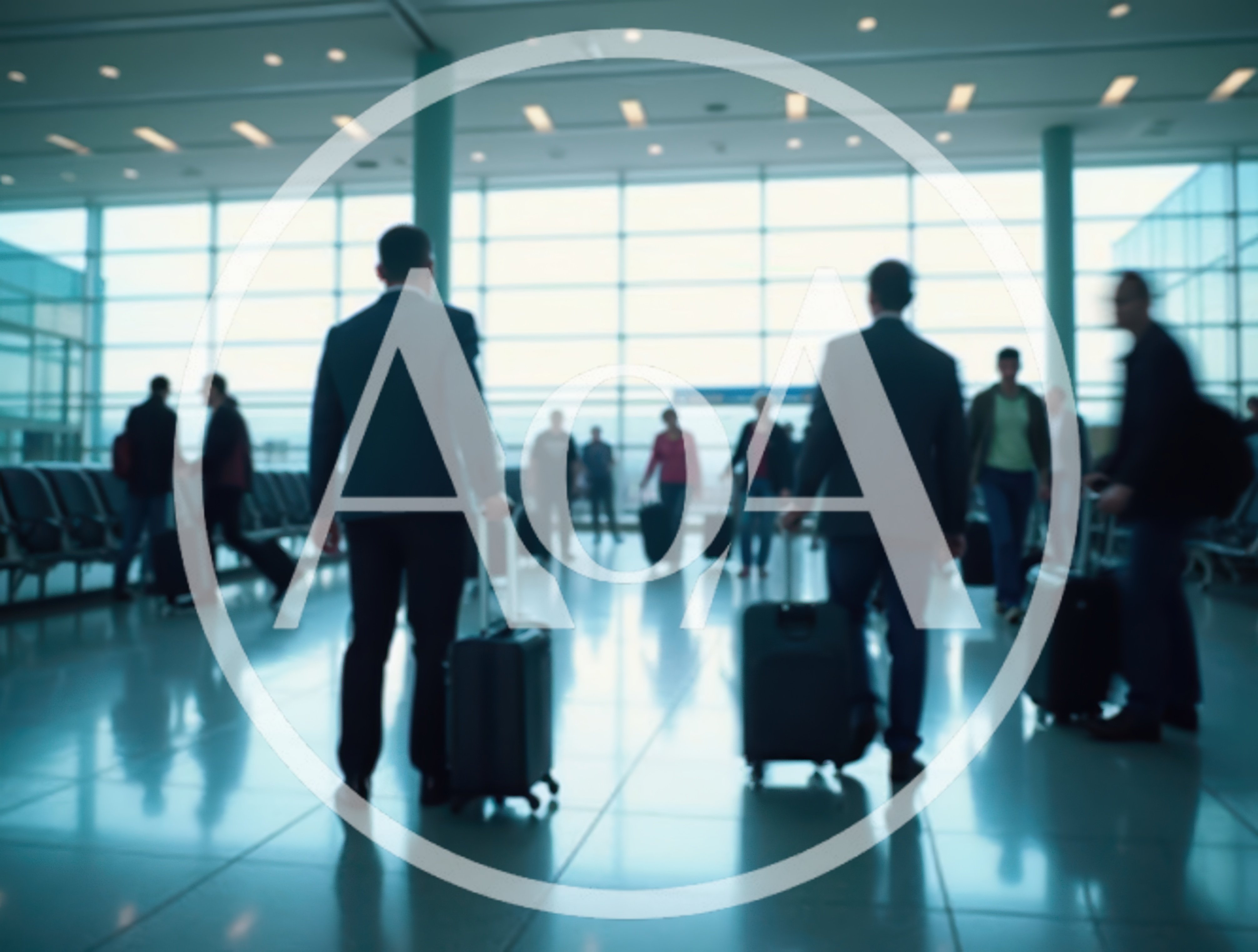 Business Travelers Walking Through A Modern Airport Terminal