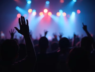 Concert Crowd With Raised Hands At Music Festival