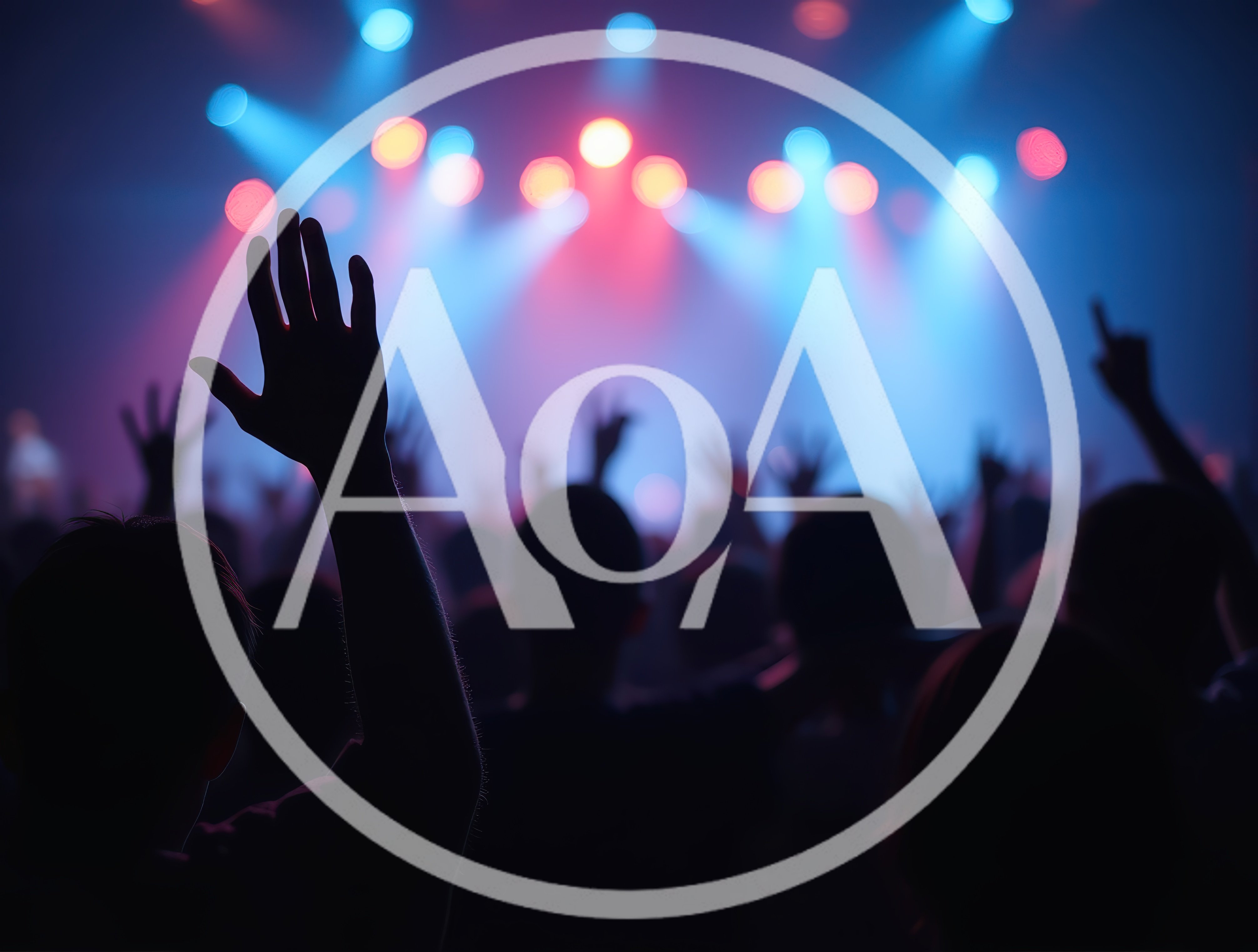Concert Crowd With Raised Hands At Music Festival