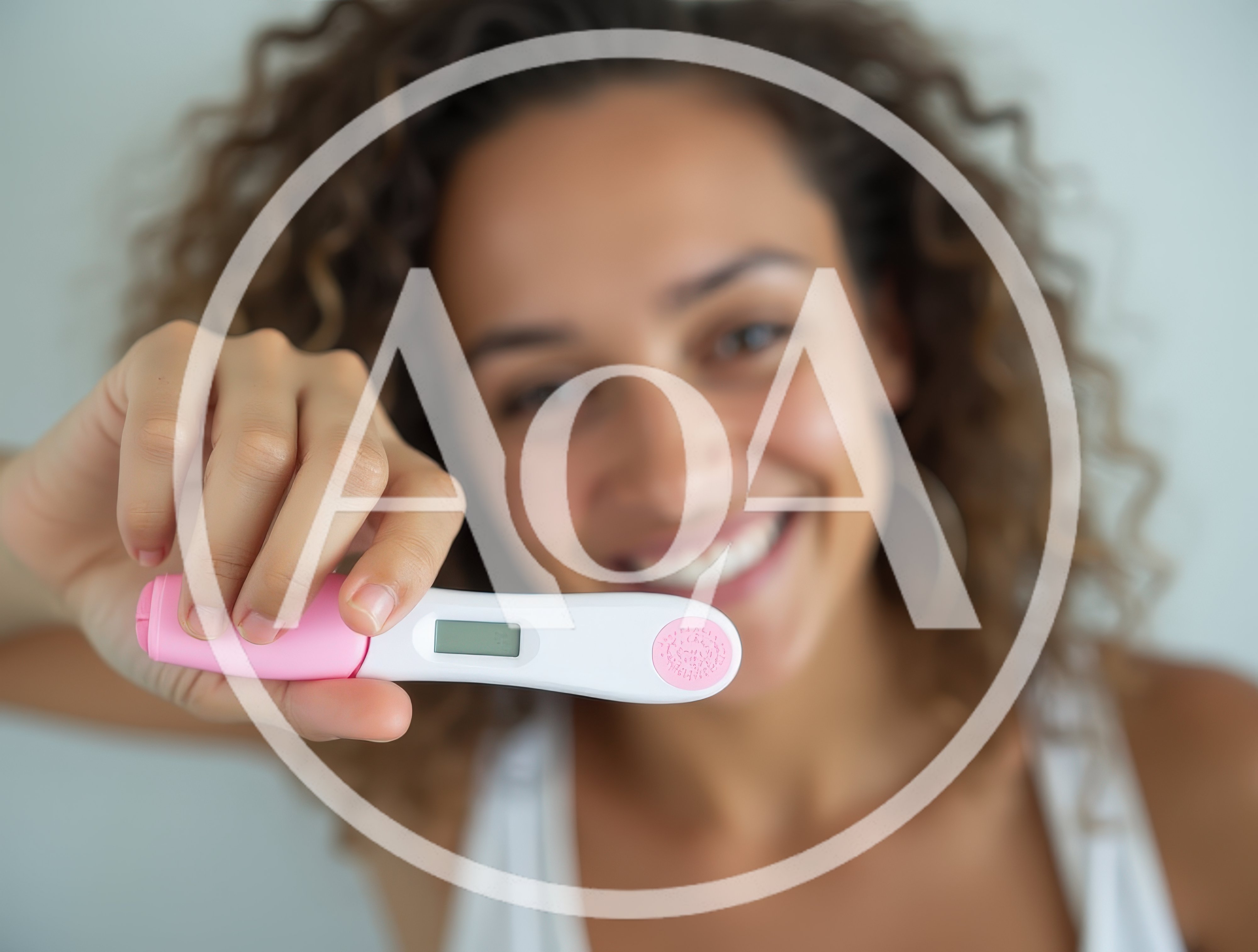 Happy Woman Holding A Positive Pregnancy Test