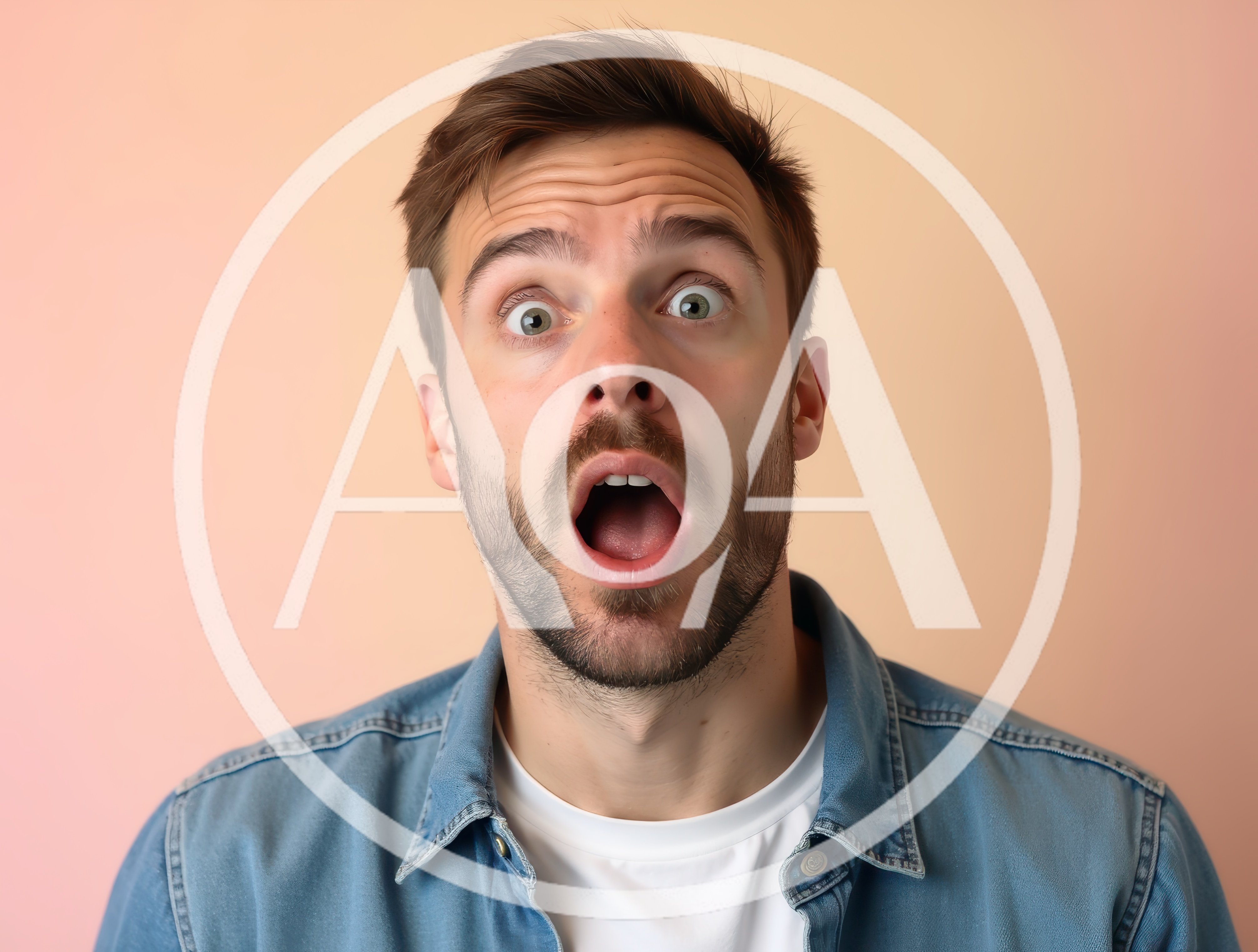 Surprised Young Man With Wide Eyes And Open Mouth