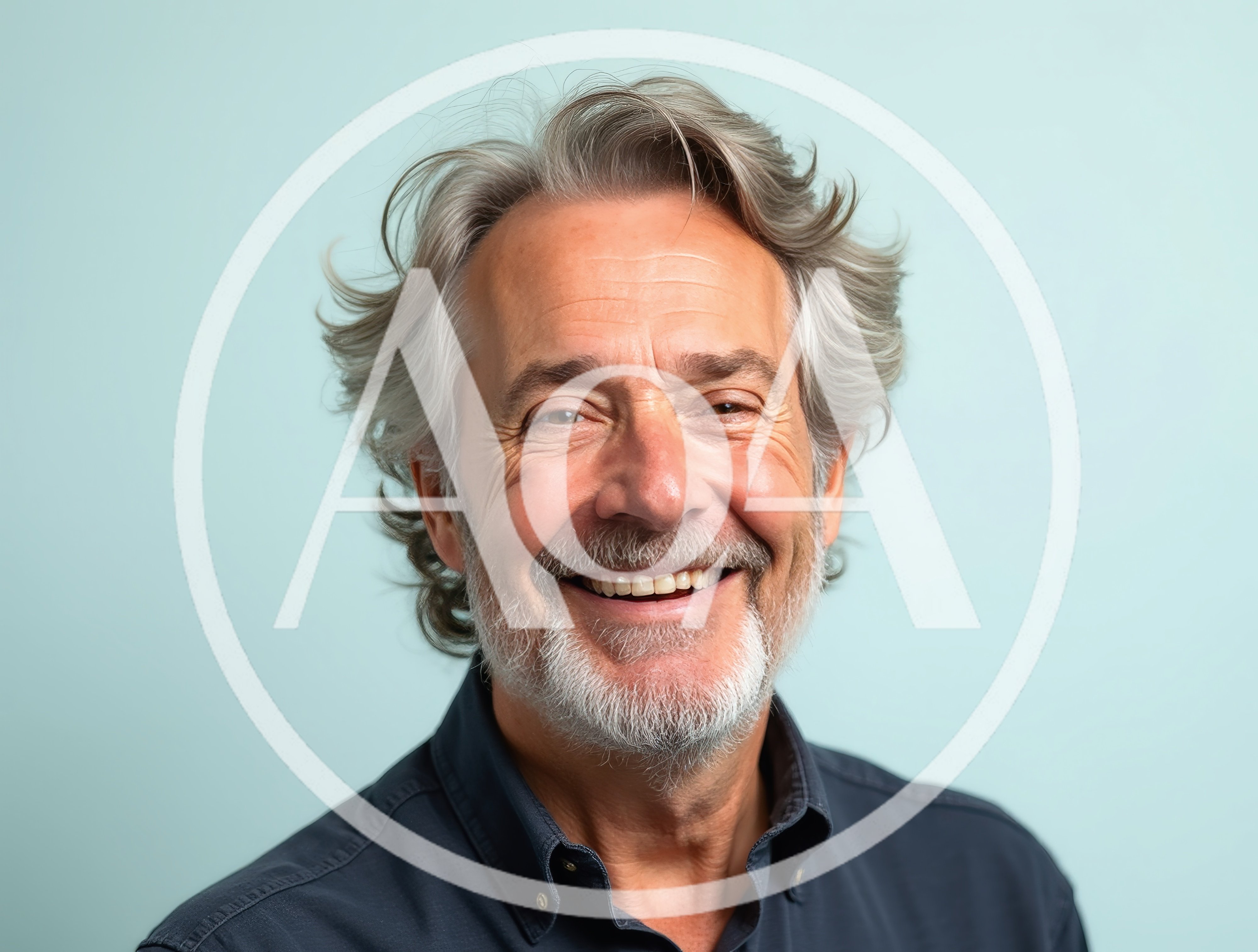 Portrait Of A Smiling Mature Man With Gray Hair
