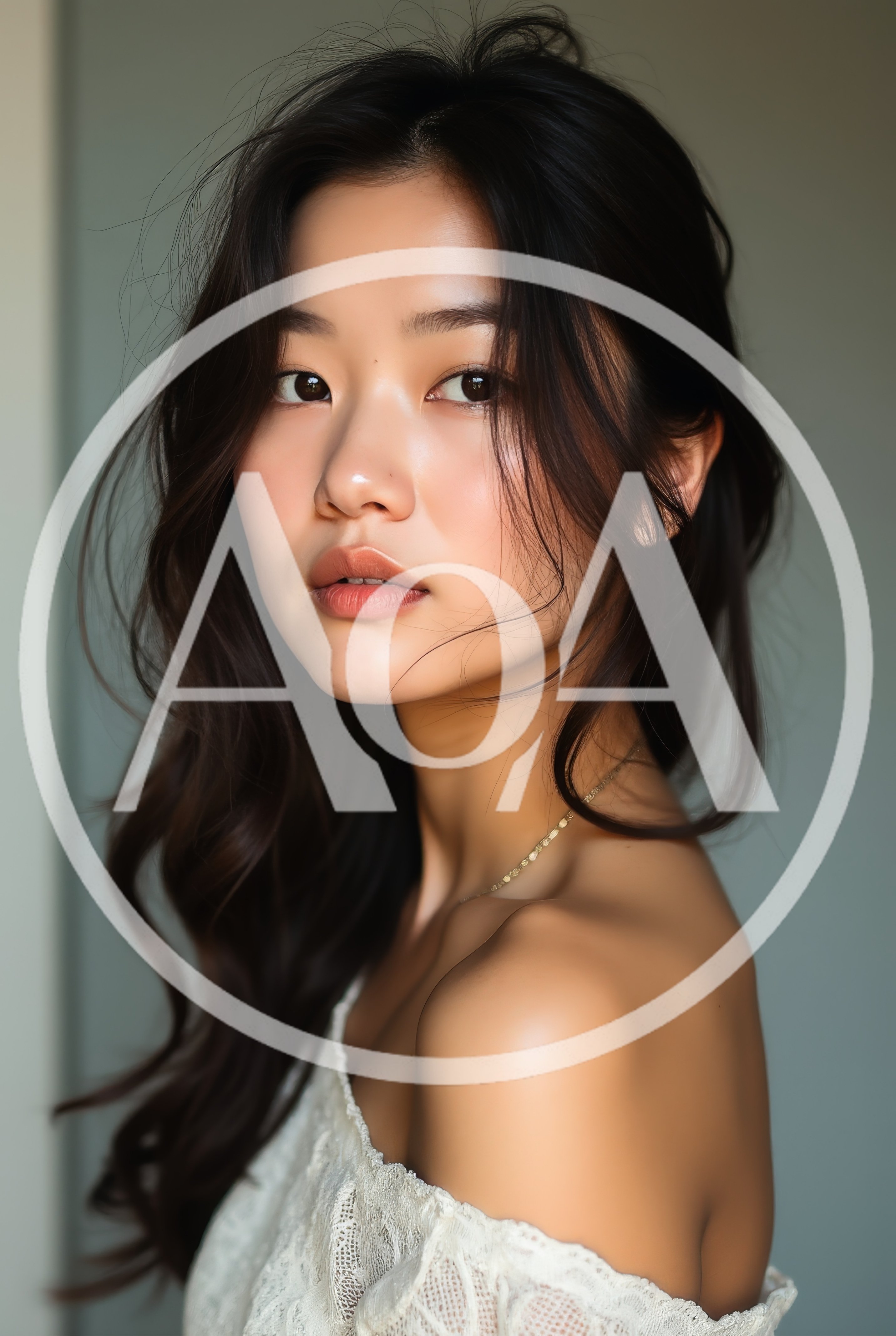 Portrait Of A Young Asian Woman With Wavy Hair